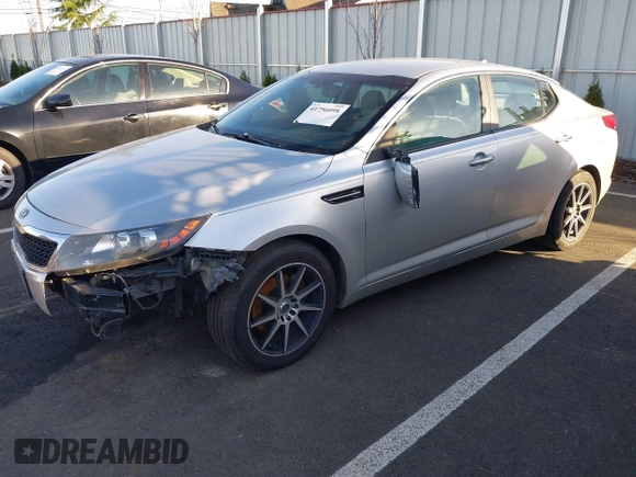 2012 Kia Optima LX with VIN KNAGM4A70C5282666, listed as a IAAI auction lot 41756098 with Not Provided miles and . Bid and sale history available at carsss.com. Image 2.