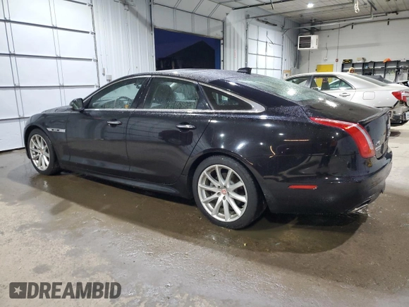 2016 Jaguar XJ R-Sport with VIN SAJWJ1CDXG8V99210, listed as a Copart auction lot 82693224 with 81,978 mi miles and Salvage title. Bid and sale history available at DreamBid. Image 2.
