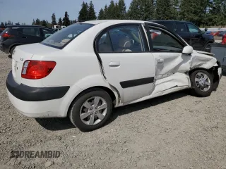 2009 Kia Rio LX with VIN KNADE223896456292, listed as a Copart auction lot 54990605 with 61,220 mi miles and Salvage Title. Bid and sale history available at DreamBid. Image 3.