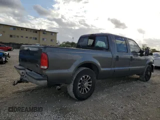 2002 Ford F-250 XL with VIN 1FTNW20F12EB93947, listed as a Copart auction lot 77836054 with 322,030 mi miles and Salvage Title. Bid and sale history available at DreamBid. Image 3.