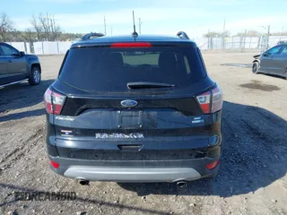 2018 Ford Escape SE z VIN 1FMCU9GD5JUB15259, wystawiony jako IAAI lot #42182040 z przebiegiem 122 194 mil mil oraz . Historia ofert i sprzedaży dostępna na DreamBid. Obrazek 17.
