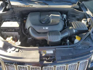 2015 Jeep Grand Cherokee Summit with VIN 1C4RJFJG0FC700014, listed as a Copart auction lot 42981765 with 144,937 mi miles and Salvage Title. Bid and sale history available at DreamBid. Image 12.
