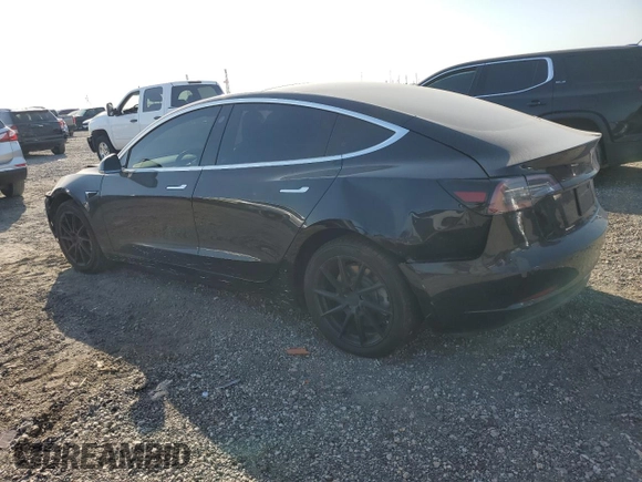 2019 Tesla Model 3 Mid Range z VIN 5YJ3E1EAXKF398909, wystawiony jako Copart lot #52504645 z przebiegiem 101 667 mil mil oraz Szkoda całkowita • Salvage title. Historia ofert i sprzedaży dostępna na DreamBid. Obrazek 2.