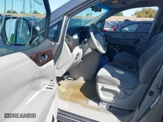 2012 Nissan Quest SL with VIN JN8AE2KP3C9033087, listed as a IAAI auction lot 41979763 with 83,085 mi miles. Bid and sale history available at carsss.com. Image 5.