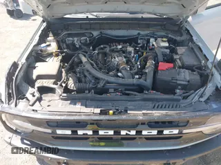 2022 Ford Bronco z VIN 1FMEE5DP3NLA80097, wystawiony jako IAAI lot #42461114 z przebiegiem 32 406 mil mil oraz . Historia ofert i sprzedaży dostępna na DreamBid. Obrazek 10.