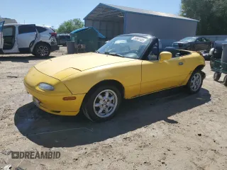1993 Mazda MX-5 Miata z VIN JM1NA3519P0411459, wystawiony jako Copart lot #50807485 z przebiegiem 148 514 mil mil oraz Szkoda całkowita • Salvage title. Historia ofert i sprzedaży dostępna na DreamBid. Obrazek 1.
