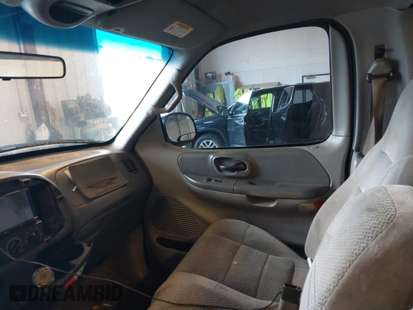 2001 Ford F-150 with VIN 1FTZF182X1KA13166, listed as a IAAI auction lot 42513979 with 197,994 mi miles and . Bid and sale history available at DreamBid. Image 5.