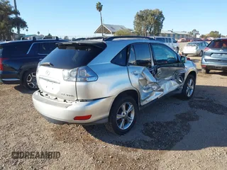 2006 Lexus RX 400h with VIN JTJHW31U560026104, listed as a IAAI auction lot 41311951 with 246,861 mi miles and . Bid and sale history available at DreamBid. Image 4.
