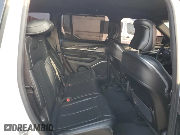 2023 Jeep Grand Cherokee Overland with VIN 1C4RJHDG8PC502208, listed as a Copart auction lot 86927734 with 53,732 mi miles and Salvage title. Bid and sale history available at DreamBid. Image 11.