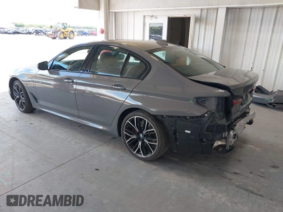 2021 BMW 5 Series 530e with VIN WBA13AG04MCF36168, listed as a IAAI auction lot 42256325 with 71,211 mi miles and . Bid and sale history available at DreamBid. Image 3.