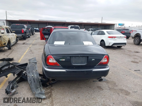 2007 Jaguar XJ with VIN SAJXA73C97TH14362, listed as a IAAI auction lot 41305716 with 120,924 mi miles and . Bid and sale history available at DreamBid. Image 16.