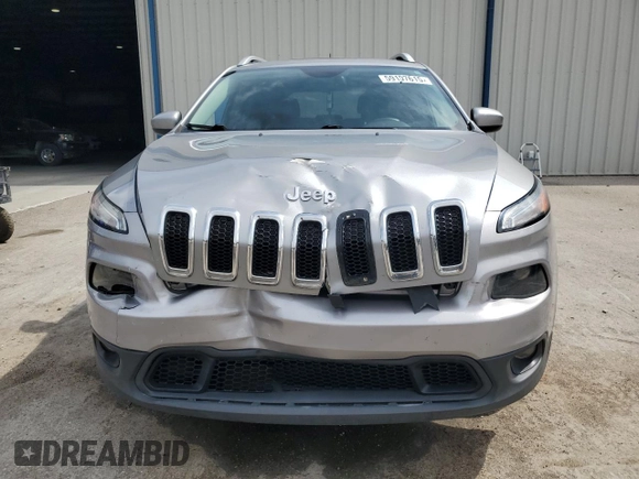 2017 Jeep Cherokee Latitude with VIN 1C4PJMCS9HW634285, listed as a Copart auction lot 59107615 with 136,984 mi miles and Salvage title. Bid and sale history available at DreamBid. Image 5.