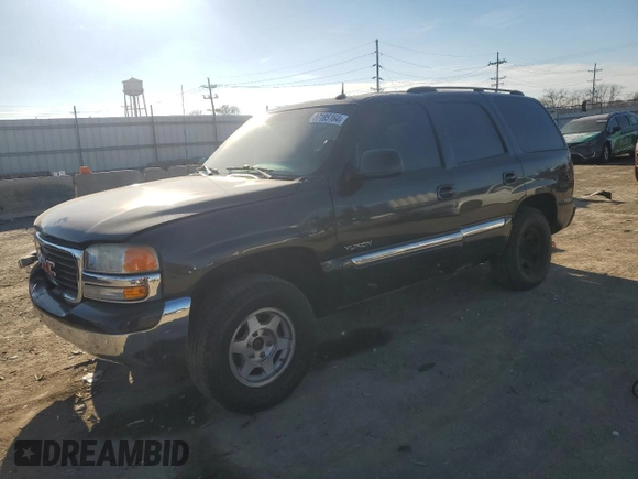 2004 GMC Yukon SLT with VIN 1GKEK13Z04R127059, listed as a Copart auction lot 87185164 with 159,667 mi miles and Salvage Title. Bid and sale history available at carsss.com. Image 1.