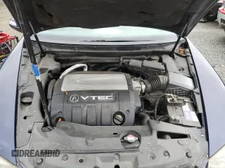 2005 Acura RL z VIN JH4KB16515C014781, wystawiony jako Copart lot #60787895 z przebiegiem Nie podano mil oraz Szkoda całkowita • Salvage title. Historia ofert i sprzedaży dostępna na DreamBid. Obrazek 11.