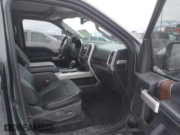 2015 Ford F-150 XLT with VIN 1FTEW1EP6FFB48630, listed as a IAAI auction lot 41597442 with 128,428 mi miles. Bid and sale history available at carsss.com. Image 5.