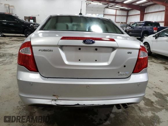 2012 Ford Fusion SE z VIN 3FAHP0HA5CR371175, wystawiony jako Copart lot #52073675 z przebiegiem 135 813 mil mil oraz Czysty tytuł • Clean title. Historia ofert i sprzedaży dostępna na DreamBid. Obrazek 6.