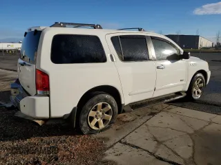 2006 Nissan Armada LE z VIN 5N1AA08B46N715720, wystawiony jako Copart lot #87299074 z przebiegiem 141 564 mil mil oraz Czysty tytuł • Clean title. Historia ofert i sprzedaży dostępna na DreamBid. Obrazek 3.