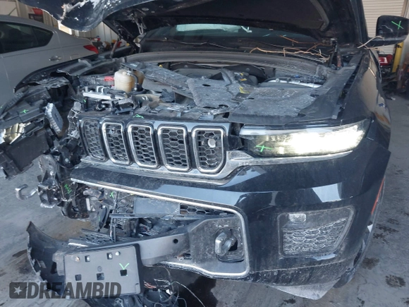 2023 Jeep Grand Cherokee Overland with VIN 1C4RJHDG5PC507978, listed as a IAAI auction lot 41394199 with 57,323 mi miles and . Bid and sale history available at DreamBid. Image 6.