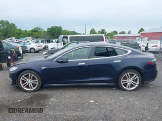 2014 Tesla Model S 60 with VIN 5YJSA1H19EFP32063, listed as a IAAI auction lot 42360872 with 103,495 mi miles and . Bid and sale history available at DreamBid. Image 14.