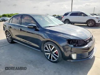 2014 Volkswagen Jetta GLI Edition 30 z VIN 3VW4S7AJ1EM390796, wystawiony jako Copart lot #61292085 z przebiegiem 138 224 mil mil oraz Czysty tytuł • Clean title. Historia ofert i sprzedaży dostępna na DreamBid. Obrazek 4.