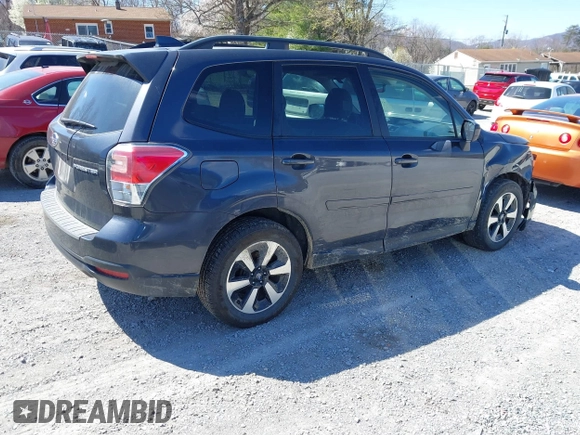 2018 Subaru Forester Premium with VIN JF2SJAGC4JH615487, listed as a IAAI auction lot 41854410 with 320,094 mi miles. Bid and sale history available at carsss.com. Image 4.