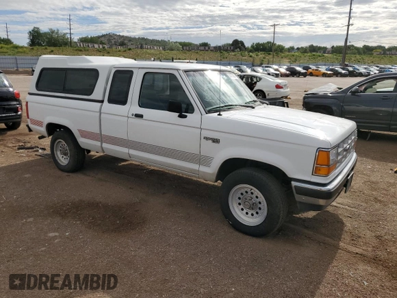 1992 Ford Ranger XLT with VIN 1FTCR15X9NPA98555, listed as a Copart auction lot 57470934 with 104,247 mi miles and Clean Title. Bid and sale history available at DreamBid. Image 4.