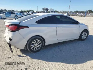 2014 Hyundai Elantra Coupe with VIN KMHDH6AH4EU024945, listed as a Copart auction lot 88100045 with 158,397 mi miles and Salvage Title. Bid and sale history available at carsss.com. Image 3.