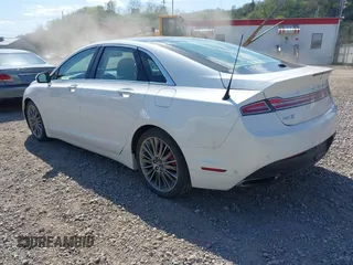 2014 Lincoln MKZ with VIN 3LN6L2J9XER808773, listed as a IAAI auction lot 42112712 with 105,832 mi miles. Bid and sale history available at carsss.com. Image 3.