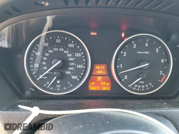 2013 BMW X5 xDrive35i z VIN 5UXZV4C59D0E01402, wystawiony jako Copart lot #55064725 z przebiegiem 108 373 mil mil oraz Szkody całkowita. Historia ofert i sprzedaży dostępna na DreamBid. Obrazek 9.