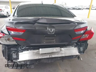 2020 Honda Accord with VIN 1HGCV3F10LA015906, listed as a IAAI auction lot 41895296 with 106,341 mi miles and . Bid and sale history available at DreamBid. Image 6.