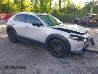 2023 Mazda CX-30 Premium с VIN 3MVDMBDY0PM507018, выставлен на аукционе IAAI как лот 42257245 с пробегом 17 550 миль миль и . История ставок и продаж доступна на DreamBid. Изображение 1.