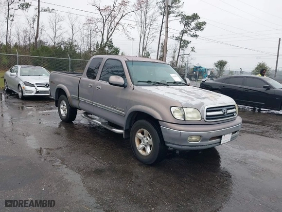 2001 Toyota Tundra Ltd with VIN 5TBBT48151S220102, listed as a IAAI auction lot 41628923 with 263,433 mi miles. Bid and sale history available at carsss.com. Image 1.