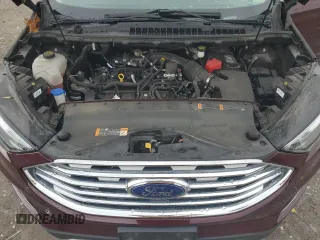 2019 Ford Edge SEL with VIN 2FMPK4J92KBB34891, listed as a Copart auction lot 60050945 with 104,942 mi miles and Salvage title. Bid and sale history available at DreamBid. Image 12.