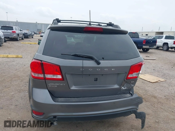 2013 Dodge Journey SXT with VIN 3C4PDDBGXDT650886, listed as a IAAI auction lot 41864331 with 224,579 mi miles and . Bid and sale history available at DreamBid. Image 16.