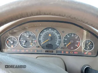 1999 Mercedes-Benz SL 500 z VIN WDBFA68FXXF184257, wystawiony jako Copart lot #59099755 z przebiegiem 166 349 mil mil oraz Czysty tytuł • Clean title. Historia ofert i sprzedaży dostępna na DreamBid. Obrazek 9.