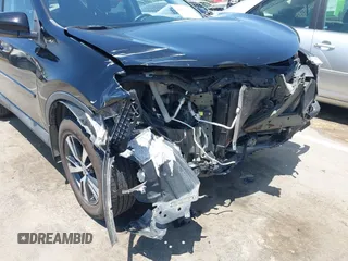 2018 Toyota RAV4 XLE with VIN 2T3WFREV2JW447623, listed as a IAAI auction lot 42410168 with 84,800 mi miles and . Bid and sale history available at DreamBid. Image 18.