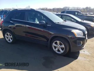 2015 Chevrolet Trax LTZ with VIN 3GNCJTSB8FL219933, listed as a Copart auction lot 53712585 with 128,325 mi miles and Clean Title. Bid and sale history available at carsss.com. Image 4.