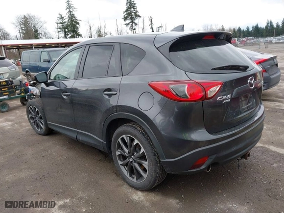 2016 Mazda CX-5 Grand Touring with VIN JM3KE4DY0G0652829, listed as a IAAI auction lot 41786042 with NaN miles. Bid and sale history available at carsss.com. Image 3.