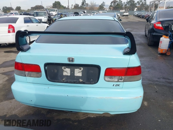1998 Honda Civic HX with VIN 1HGEJ7127WL127977, listed as a IAAI auction lot 41230187 with 182,000 mi miles. Bid and sale history available at carsss.com. Image 17.