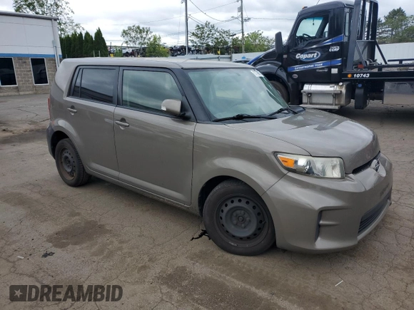2012 Scion xB z VIN JTLZE4FE1CJ014494, wystawiony jako Copart lot #57779675 z przebiegiem 151 857 mil mil oraz Szkody całkowita. Historia ofert i sprzedaży dostępna na DreamBid. Obrazek 4.