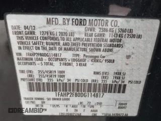 2013 Ford Taurus Limited with VIN 1FAHP2F80DG114817, listed as a IAAI auction lot 41429111 with 207,104 mi miles. Bid and sale history available at carsss.com. Image 9.
