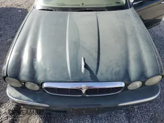 2004 Jaguar XJ with VIN SAJWA71C34SG29498, listed as a Copart auction lot 42653715 with 116,956 mi miles and Salvage Title. Bid and sale history available at carsss.com. Image 11.