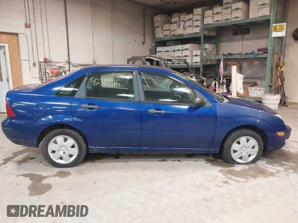 2006 Ford Focus S z VIN 1FAFP34N66W232191, wystawiony jako IAAI lot #42319916 z przebiegiem 51 438 mil mil oraz . Historia ofert i sprzedaży dostępna na DreamBid. Obrazek 14.