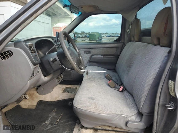 2000 Nissan Frontier 2WD XE with VIN 1N6DD21S8YC430562, listed as a Copart auction lot 86827384 with 0 mi miles and Salvage Title. Bid and sale history available at carsss.com. Image 7.