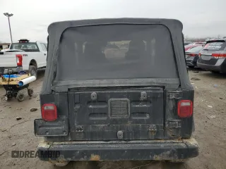 2003 Jeep Wrangler Sport with VIN 1J4FA49S33P345306, listed as a Copart auction lot 46899265 with 143,858 mi miles and Clean Title. Bid and sale history available at carsss.com. Image 6.