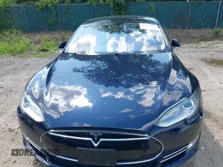 2013 Tesla Model S with VIN 5YJSA1CN0DFP21851, listed as a IAAI auction lot 42557791 with 106,328 mi miles and . Bid and sale history available at DreamBid. Image 13.