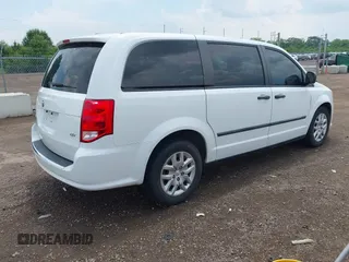2014 Ram Cargo Van Tradesman with VIN 2C4RRGAGXER459213, listed as a IAAI auction lot 42590594 with 174,217 mi miles and . Bid and sale history available at DreamBid. Image 4.