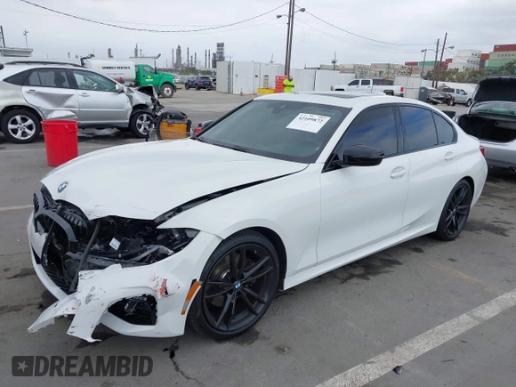 2021 BMW 3 Series 330i z VIN 3MW5R1J04M8C06043, wystawiony jako IAAI lot #42109872 z przebiegiem 62 325 mil mil oraz . Historia ofert i sprzedaży dostępna na DreamBid. Obrazek 2.