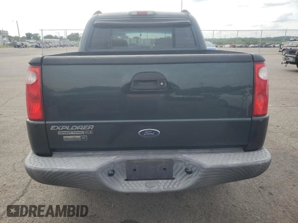 2004 Ford Explorer Sport Trac XLS z VIN 1FMZU77K24UB43103, wystawiony jako Copart lot #55955144 z przebiegiem 197 274 mil mil oraz Szkoda całkowita • Salvage title. Historia ofert i sprzedaży dostępna na DreamBid. Obrazek 6.