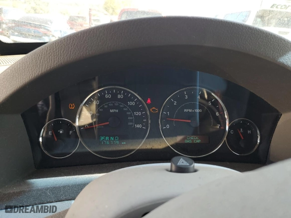 2007 Jeep Grand Cherokee Limited with VIN 1J8HR58247C572413, listed as a Copart auction lot 74297694 with 176,779 mi miles and Salvage Title. Bid and sale history available at carsss.com. Image 9.